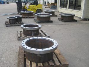 Custom Engineered AWWA Class E Skirt Flanges being readied for shipment